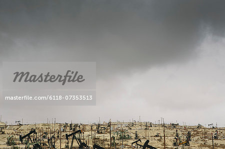 Oil rigs and wells in the Midway-Sunset shale oil fields, the largest in California