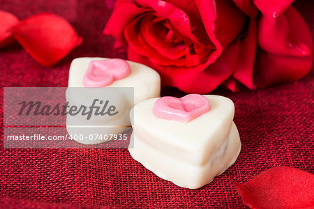 Composition for Valentine's day with small heart chocolates - ideal for your valentine's design