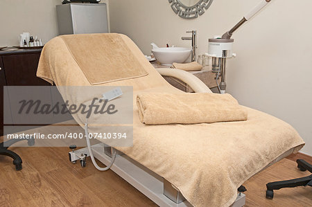 Electric treatment bed in beauty salon of luxury health spa
