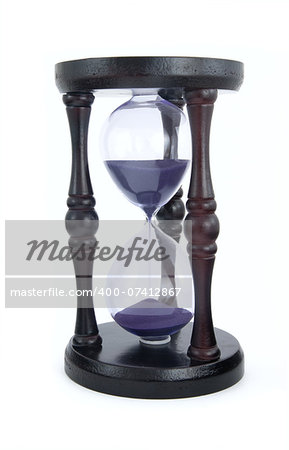 Old-fashioned hourglass isolated on white