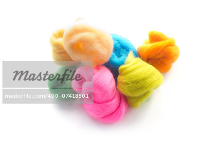 Colorful wool tops isolated on white