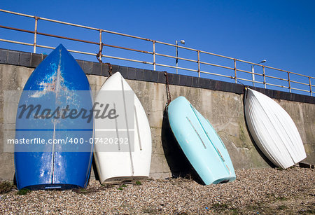 Blue and white boats at Southend-on-Sea, Essex, England against a blue sky