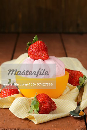 strawberry ice cream served with fresh berries