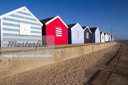 Colourful Beach Huts at Southwold, Suffolk , England,against a blue sky