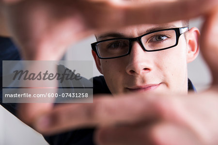 Young Man Working in Office, Mannheim, Baden, Wurttemberg, Germany Young Man Working in Office, Mannheim, Baden, Wurttemberg, Germany