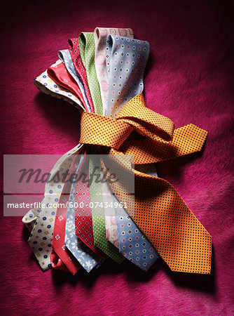 Colorful Ties on Pink Background