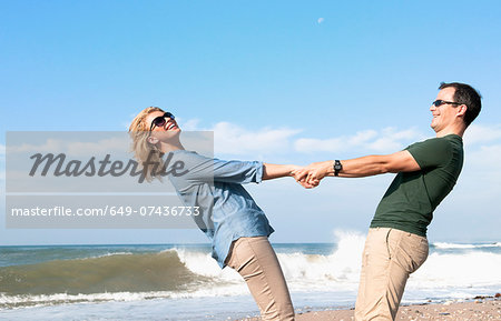Couple enjoying vacation on beach