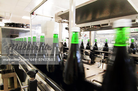 Bottling machine in industrial wine cellar