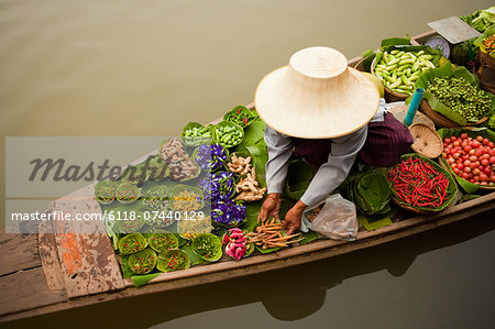 Floating markets are a common tradition throughout Southeast Asia. Bangkok, Thailand.