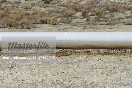 Elevated steam pipeline in the Midway-Sunset oil fields, the largest shale oil field in California.