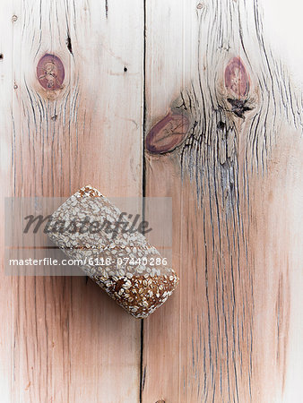 Organic Multi Grain Bread Loaf Cooling on Reclaimed Lumber Table Top Organic Multi Grain Bread Loaf Cooling on Reclaimed Lumber Table Top