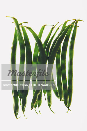 Organic green string beans on white background