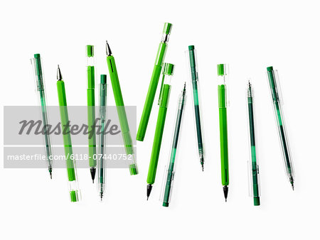 Green Office Supplies. A group of pens, blue and green colours.