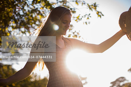 Teenage girl dancing in park