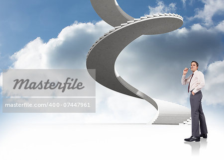 Thinking businessman holding glasses against spiral staircase in the sky