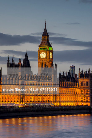 Big Ben clock tower stands above the Houses of Parliament at dusk, UNESCO World Heritage Site, Westminster, London, England, United Kingdom, Europe
