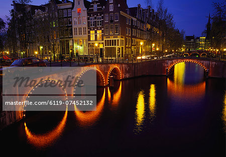 Illuminated Bridges Reflected in the Canals at Night, Keizersgracht, Amsterdam, Netherlands