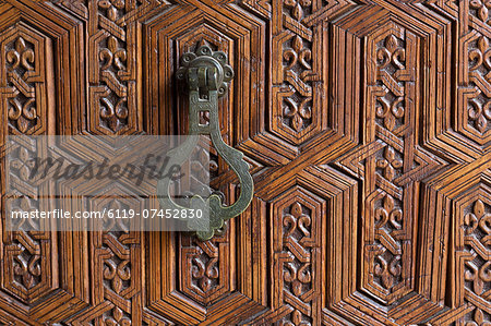 Detail of a carved wooden door in the Musee de Marrakech, Marrakech, Morocco, North Africa, Africa Detail of a carved wooden door in the Musee de Marrakech, Marrakech, Morocco, North Africa, Africa
