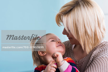 Baby Girl on Mother's Lap in Doctor's Office