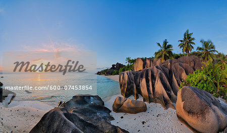 Rock Formations and Palm Trees at Sunset, Anse Source d´Argent, La Digue, Seychelles