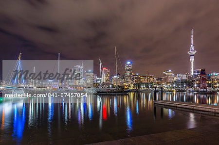 Night view of the city of Auckland from Auckland Harbour, North Island, New Zealand, Pacific