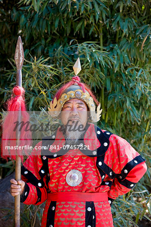 Man dressed in Mongolian Warrior costume at The Great Wall of China, Mutianyu, north of Beijing