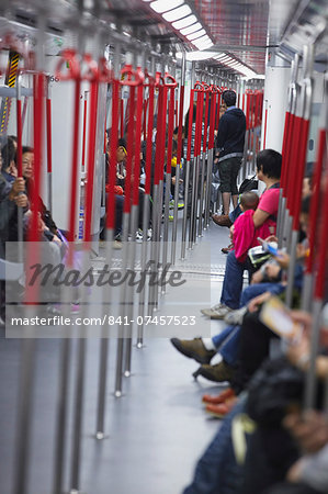 Passengers on MTR train, Hong Kong, China, Asia