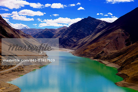 Mountain range and artificial lake (reservoir) near the Karo-La Pass, beside the Friendship Highway, Tibet, China, Asia