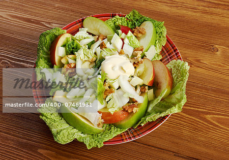 Waldorf salad made of fresh apples, celery and walnuts.farm-style