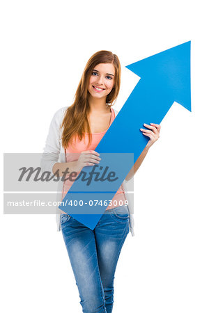 Beautiful blonde woman holding a blue arrow
