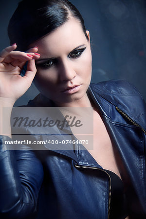 attractive young sexy woman with smokey eyes portrait