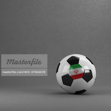 Iranian soccer ball in front of plaster wall