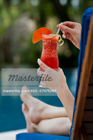 fresh tropical juice cocktail served pool side in Belize