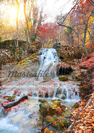 Autumn mountain river in a colorful forest