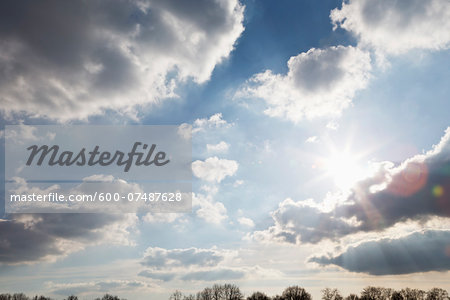 Sun and Clouds in Sky, Kaarst, North Rhine-Westphalia, Germany