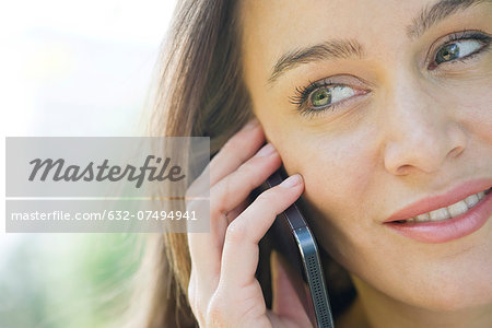 Woman talking on smartphone