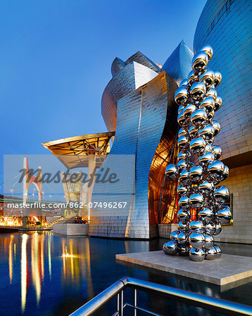 Spain, Bilbao, Guggenheim museum at dusk.