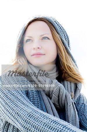 Portrait of a beautiful woman wearing a scarf