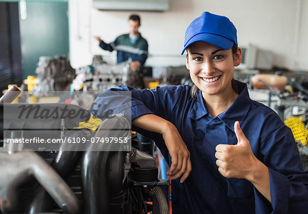 Happy trainee showing thumb up in workshop