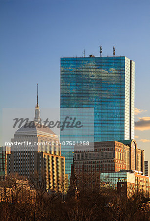 Downtown Boston bathed in the light of the sun setting