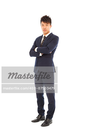 Confident businessman standing and  crossed arms