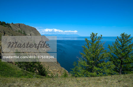 Steep rocky coast at the northern tip of the island of Olkhon. Lake Baikal, Russia.