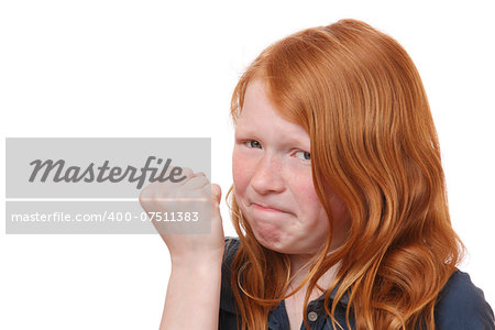 Portrait of an angry young girl on white background