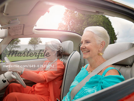 Senior women driving in convertible