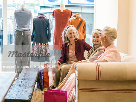 Senior women taking a break in boutique