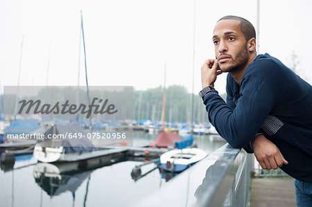 Portrait of young man in marina