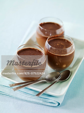 Small pots of chocolate cream dessert