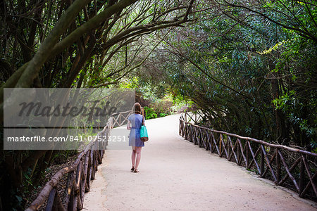 Tourist at the Quarry Garden at the Archaeological Park of Syracuse (Siracusa), UNESCO World Heritage Site, Sicily, Italy, Europe