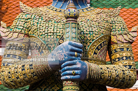 Indrajit Giant statue guards an entrance to Wat Phra Kaeo, Bangkok, Thailand