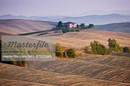 Typical Tuscan homestead and landscape near Montalcino, Val D'Orcia, Tuscany, Italy